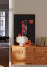 Cuadro surrealista de escalera y puerta cósmica con galaxia, disponible en kudeko.com.