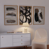 Conjunto de cuadros marrón minimalistas abstractos con pinceladas modernas en tonos marrones, negros y blancos, disponibles en kudeko.com.