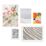 Conjunto de cuadros con arte floral, fotografía de paisajes, patrones geométricos y colores vibrantes, disponible en kudeko.com.