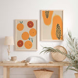 decoración con cuadros, ideas - Conjunto de dos cuadros coloridos, ilustración con naranjas y papayas. Una combinación de cuadros hechos para convivir el uno con el otro