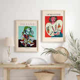 Ensemble de deux tableaux avec portraits artistiques inspirés de Picasso et Henri Matisse, figures féminines, tons turquoise, corail, crème, noir et bleu, style illustration classique et créatif. Disponible sur kudeko.com
