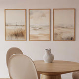 <b>Conjunto de tres cuadros abstractos </b>en tonos marfil, representación de paisaje de playa