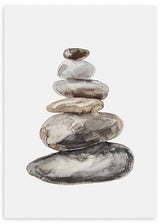 Cuadro de piedras apiladas en equilibrio, en tonos gris, beige, marrón y negro, con fondo blanco y estilo minimalista. Disponible en kudeko.com