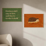 Cuadro con frase "Cowboys ain't easy to love and they're harder to hold" sobre fondo verde, kudeko.com