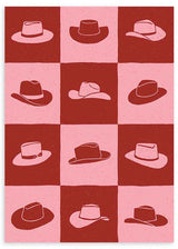 Cuadro con cuadrícula de sombreros vaqueros en bloques rosa y rojo terracota, composición gráfica de aire retro y estilo pop art. Disponible en kudeko.com