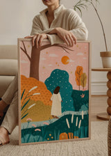 Farbiges illustriertes Wandbild mit einer Frau, die zwischen Hügeln und rosafarbenem Himmel mit Sonne und Sternen geht, von Bea Muller. Erhältlich auf kudeko.com