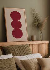 Quadro geométrico com formas circulares em bordô sobre fundo bege, composição simétrica de estilo decorativo simples. Disponível em kudeko.com
