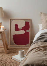 Quadro abstrato com formas orgânicas em tons de bordô e bege, estilo decorativo simples e contemporâneo. Disponível em kudeko.com