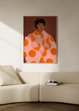 Farbiges Wandbild mit weiblichem Porträt und rosa Mantel mit orangefarbenen Kreisen, von Bea Muller. Erhältlich auf kudeko.com