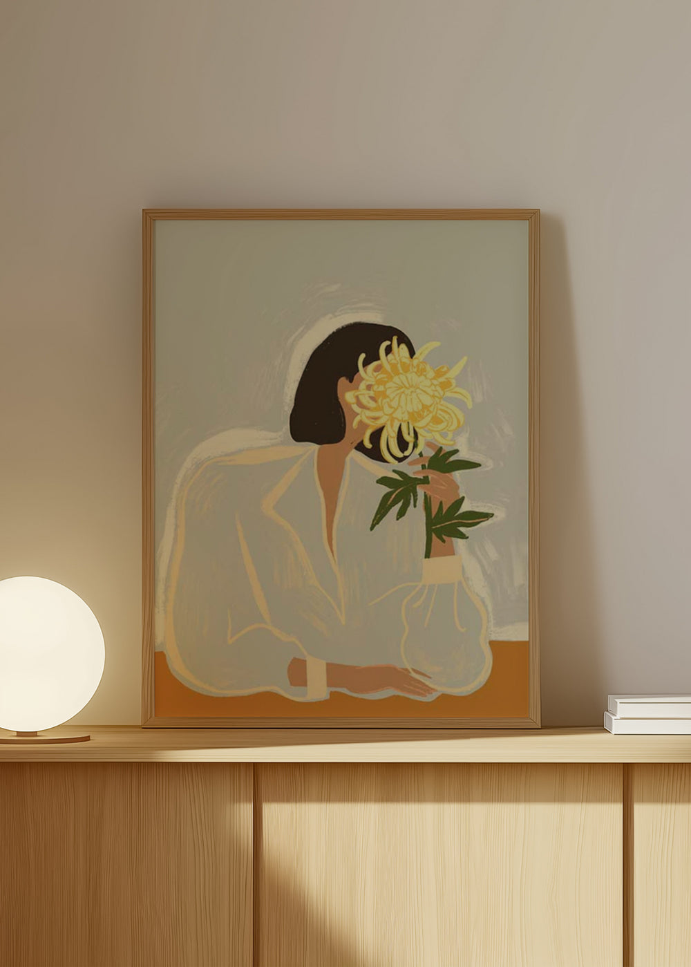 Cuadro decorativo de estilo minimalista y sereno colocado en salón, mujer con crisantemo en estilo minimalista, modelo Thecrysanthemum
