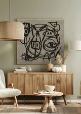 Quadro quadrado com composição abstrata em preto e bege, grande olho central, formas simbólicas, linhas entrelaçadas e rosto fragmentado de estilo gráfico. Disponível em kudeko.com