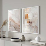 Quadro com composição abstrata de formas translúcidas, linhas curvas finas e tons de bege, creme, branco sujo e castanho suave, num estilo contemporâneo. Disponível em kudeko.com
