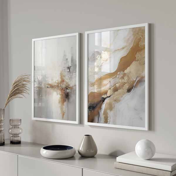 Ensemble de deux tableaux abstraits en blanc cassé, beige, doré et noir, avec formes fluides, composition urbaine diffuse et style contemporain raffiné. Disponible sur kudeko.com