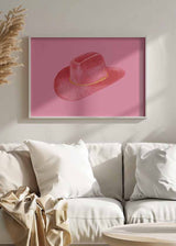 Cuadro ilustración de sombrero rojo sobre fondo rosa vibrante, kudeko.com