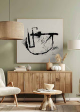 Cuadro cuadrado con composición abstracta en negro y blanco roto, con manchas irregulares, líneas curvas y formas gestuales de estilo abstracto. Disponible en kudeko.com