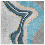 Tableau carré avec formes abstraites ondulées en bleu turquoise, gris, blanc et noir, fins détails dorés, fond texturé et style contemporain. Disponible sur kudeko.com