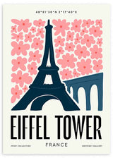 Cuadro con la Torre Eiffel azul oscuro, flores rosas grandes, fondo claro y composición gráfica de inspiración parisina en estilo vintage. Disponible en kudeko.com