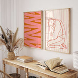 Tableau avec bandes diagonales irrégulières en rose corail et orange terre cuite, composition abstraite dynamique au contraste marqué et au style contemporain. Disponible sur kudeko.com