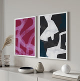 Cuadro abstracto en blanco y negro con formas irregulares, en marco negro, kudeko.com