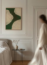 Cuadro abstracto con formas crema sobre fondo verde oscuro, en marco negro, kudeko.com