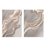 Conjunto de dos cuadros abstractos con diseño fluido en tonos beige. kudeko.com