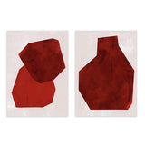 Conjunto de dos cuadros con figuras geométricas irregulares en tonos terracota, rojo profundo y granate sobre fondo claro, de estilo geométrico. Disponible en kudeko.com