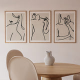 decoración con cuadros, ideas - conjunto de cuadros de ilustraciones artísticas de mujer en trazos sobre fondo beige - kudeko