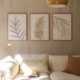 decoración con cuadros, ideas - conjunto de cuadros florales, estilo nórdico y tonos amarillos - kudeko