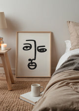 Cuadro decorativo de estilo minimalista y abstracto colocado en sala, rostro abstracto en blanco y negro, modelo Rostro Negro