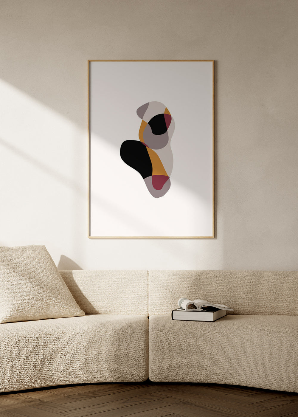 Tableau encadré avec formes organiques superposées en noir, beige, gris taupe, moutarde et bordeaux sur fond clair, dans un style minimaliste et contemporain. Disponible sur kudeko.com