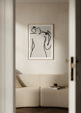 Cuadro decorativo de estilo minimalista y nórdico colocado en salón, silueta femenina de línea continua, modelo Women Sketch I