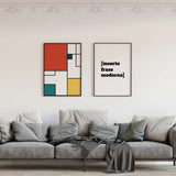 Cuadro con composición geométrica de rectángulos rojos, blancos, azul petróleo y amarillo mostaza, con líneas negras marcadas y estilo geométrico. Disponible en kudeko.com