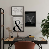 Quadro com coruja frontal, linhas brancas, formas angulares simétricas, fundo preto e composição limpa de estilo geométrico elegante. Disponível em kudeko.com