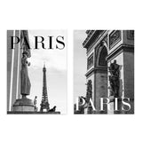 Set aus zwei gerahmten Wandbildern mit Eiffelturm und Arc de Triomphe in Weiß, Schwarz und Grau, mit PARIS Typografie und fotografischem urbanem Stil. Erhältlich auf kudeko.com