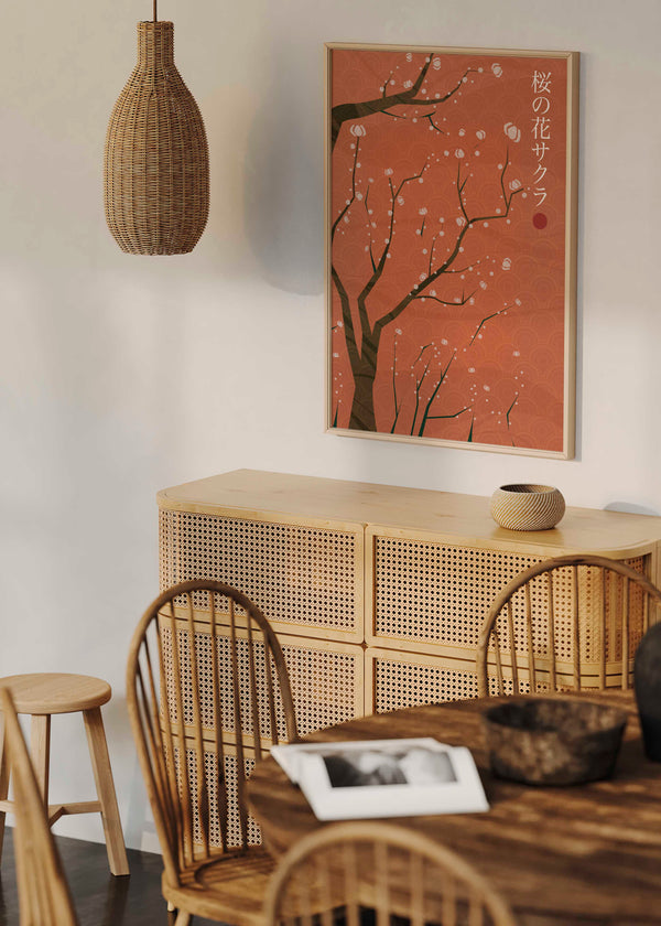 Cuadro japonés con ramas de cerezo en flor sobre fondo terracota, kudeko.com
