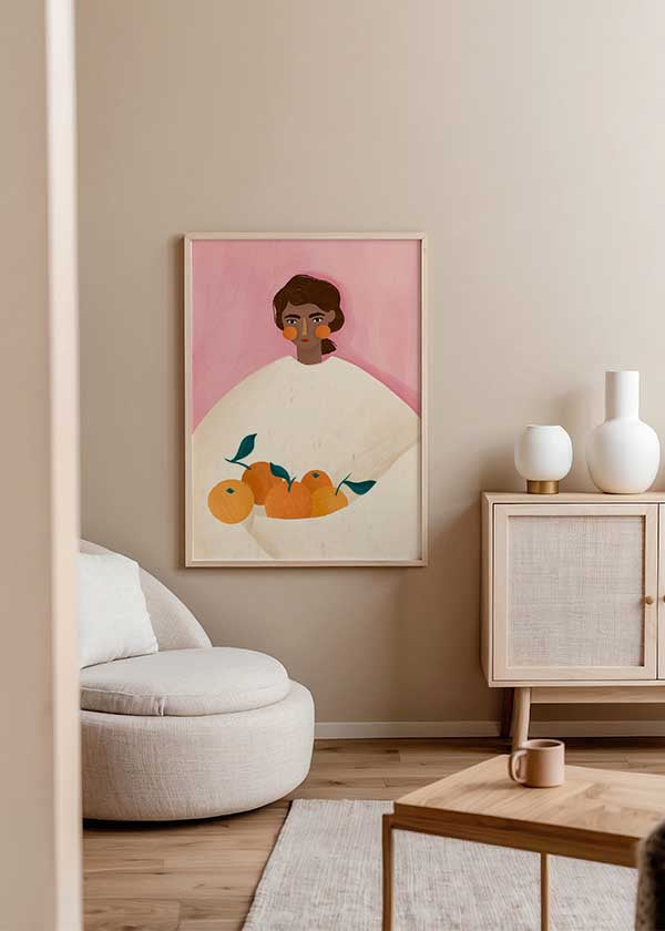 Cuadro ilustrado colorido con retrato femenino sosteniendo naranjas, obra de Bea Muller, kudeko.com
