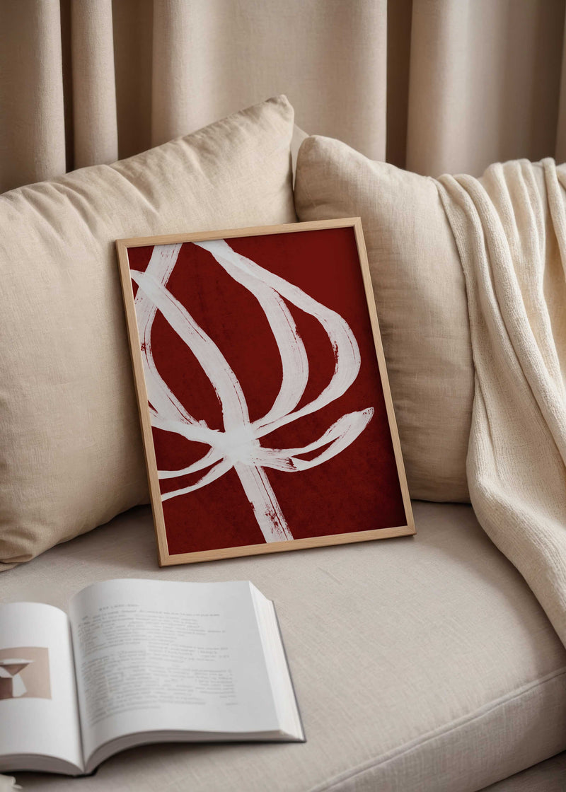 Cuadro floral minimalista con flor blanca sobre fondo burdeos intenso, kudeko.com
