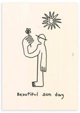 Cuadro con figura humana de líneas negras, pequeña flor en la mano, sol sonriente y fondo crema, de estilo ilustración. Disponible en kudeko.com