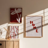 Conjunto de tres cuadros abstractos terracota con tipografía, líneas y flor minimalista, kudeko.com
