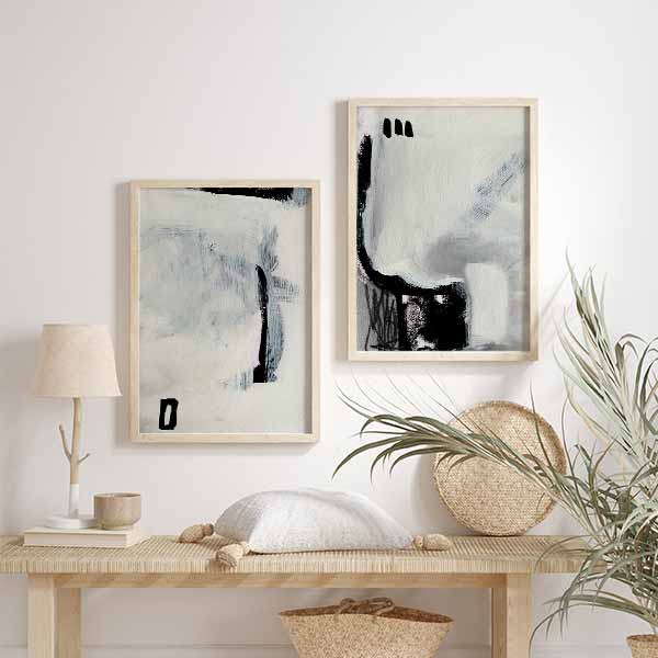 Conjunto de dos cuadros abstractos en blanco y negro con texturas kudeko.com