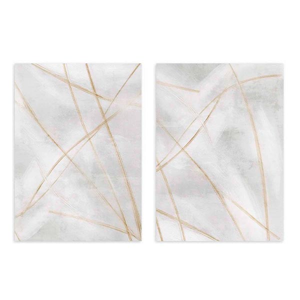 Conjunto de dos cuadros con líneas doradas finas cruzadas sobre fondo blanco y gris claro, composición suave de estilo abstracto. Disponible en kudeko.com