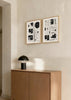 Set aus zwei Wandbildern mit abstrakter Komposition in Schwarz und Weiß, organischen Formen, unregelmäßigen Blöcken, lockeren Linien und grafischem Kontrast im modernen Stil. Erhältlich auf kudeko.com