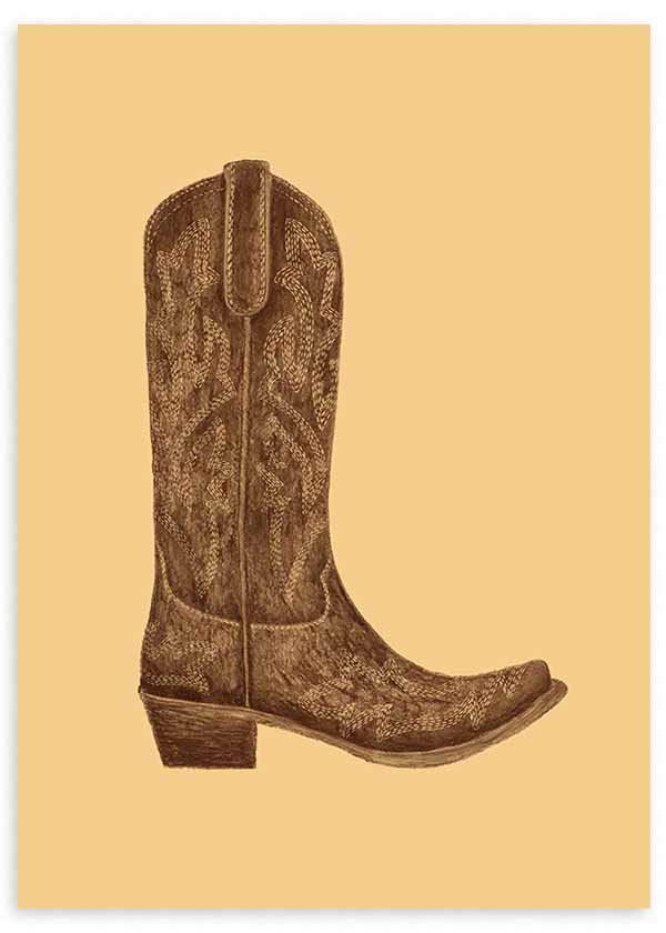 Tableau encadré avec botte cowgirl marron, détails ornementaux, fond beige uni et style illustration western aux tons terre. Disponible sur kudeko.com