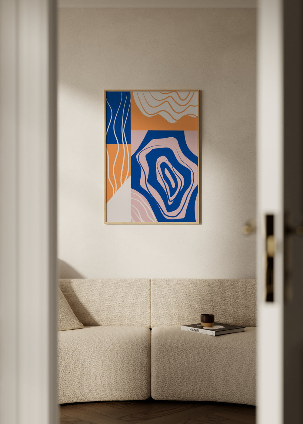 Tableau encadré avec composition abstraite de formes organiques, blocs courbes et lignes ondulées en bleu, orange, rose poudré et blanc cassé, dans un style contemporain. Disponible sur kudeko.com