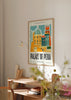 Tableau encadré illustré du Palais de Pena avec tours, coupole et façades en jaune, turquoise, orange et bleu foncé, dans un style architectural graphique et décoratif. Disponible sur kudeko.com