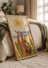 Gerahmtes Wandbild mit liegender Frauenfigur zwischen großen tropischen Blättern, goldener Sonne, beigem und blauem Himmel, in Terrakotta- und Grüntönen, illustrativer Stil. Erhältlich auf kudeko.com