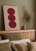 Wandbild mit geometrischen kreisförmigen Formen in Bordeaux auf beigem Hintergrund, symmetrische Komposition mit klarem dekorativem Stil. Erhältlich auf kudeko.com