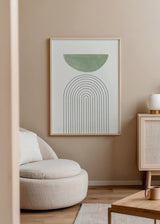 Gerahmtes Wandbild mit abstrakter Komposition aus schwarzen Linienbögen, salbeigrünem Halbkreis, weißem Hintergrund und minimalistischem Stil für nordische Einrichtung. Erhältlich auf kudeko.com