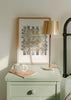 Tableau encadré avec composition abstraite de rectangles entrelacés beige, gris, crème et sable sur fond clair texturé, dans un style contemporain épuré. Disponible sur kudeko.com