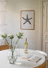 Cuadro decorativo de estilo minimalista y blanco_y_negro colocado en baño, estrella de mar vintage en blanco y negro, modelo Vintage Starfish